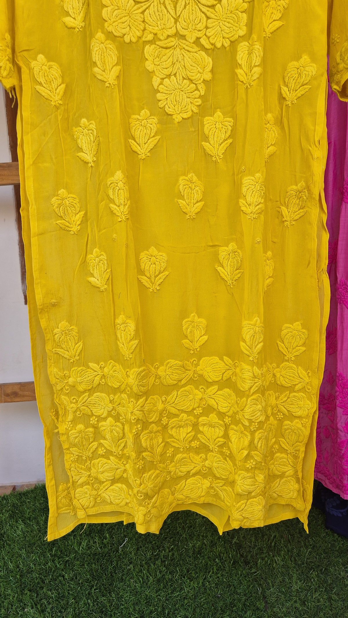 Turmeric yellow premium silk long kurta with intricate handmade Lucknow chikankari embroidery by LVW Fashions.
