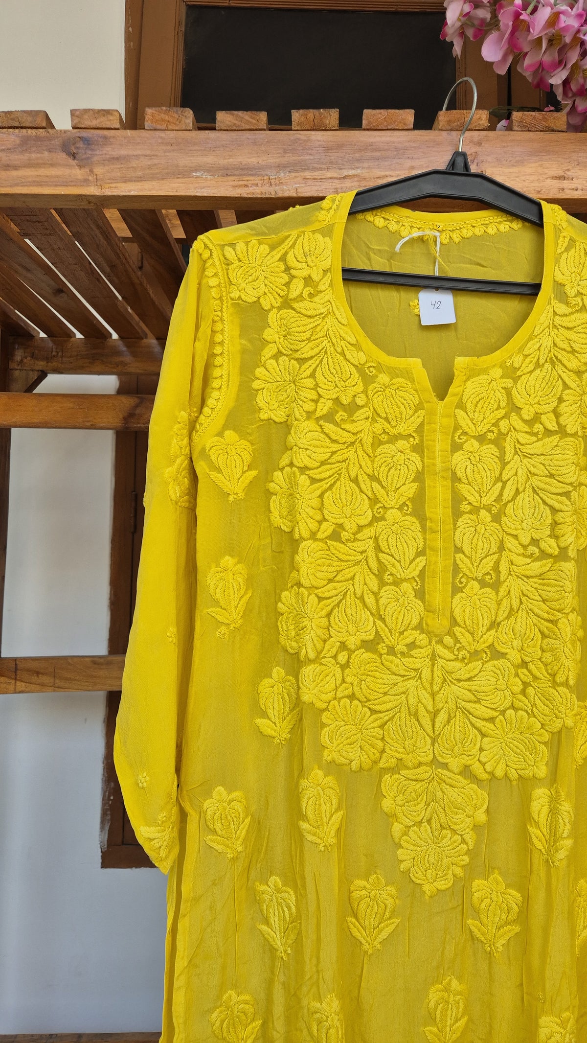 Turmeric yellow silk long kurta with intricate Chikankari embroidery by LVW Fashions, handmade in Lucknow, luxurious and elegant.