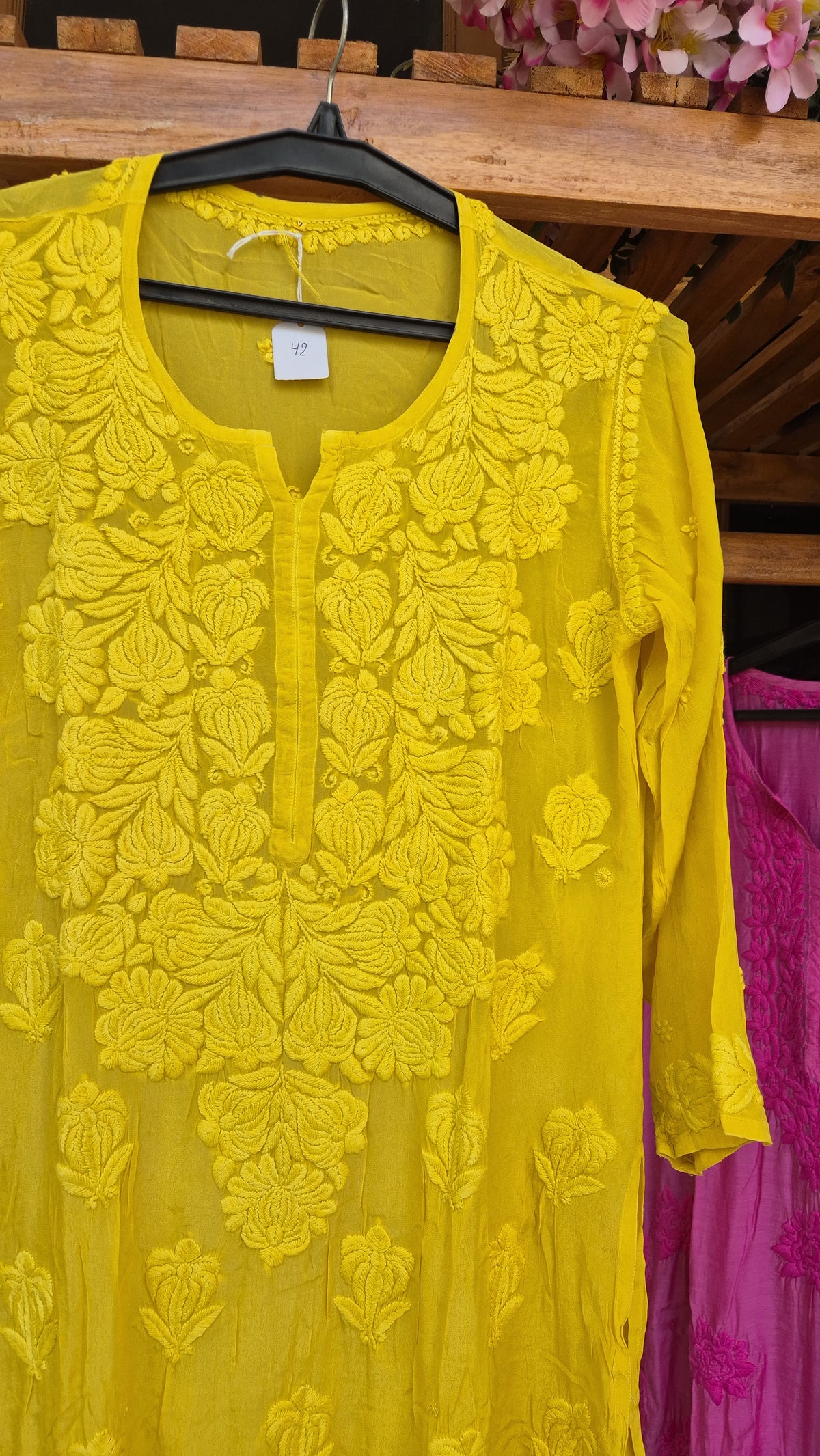 Turmeric yellow luxury silk long kurta with intricate handmade chikankari embroidery by LVW Fashions, traditional Lucknow design.