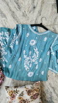 Turquoise sunflower silk chikankari kurta by LVW Fashions featuring intricate handmade Lucknow chikankari design.