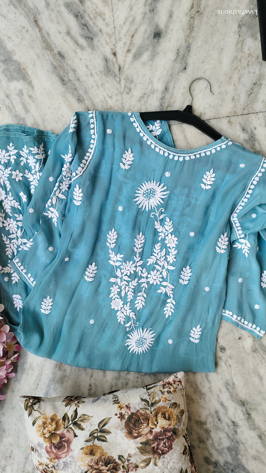 Turquoise sunflower silk chikankari kurta by LVW Fashions featuring intricate handmade Lucknow chikankari design.
