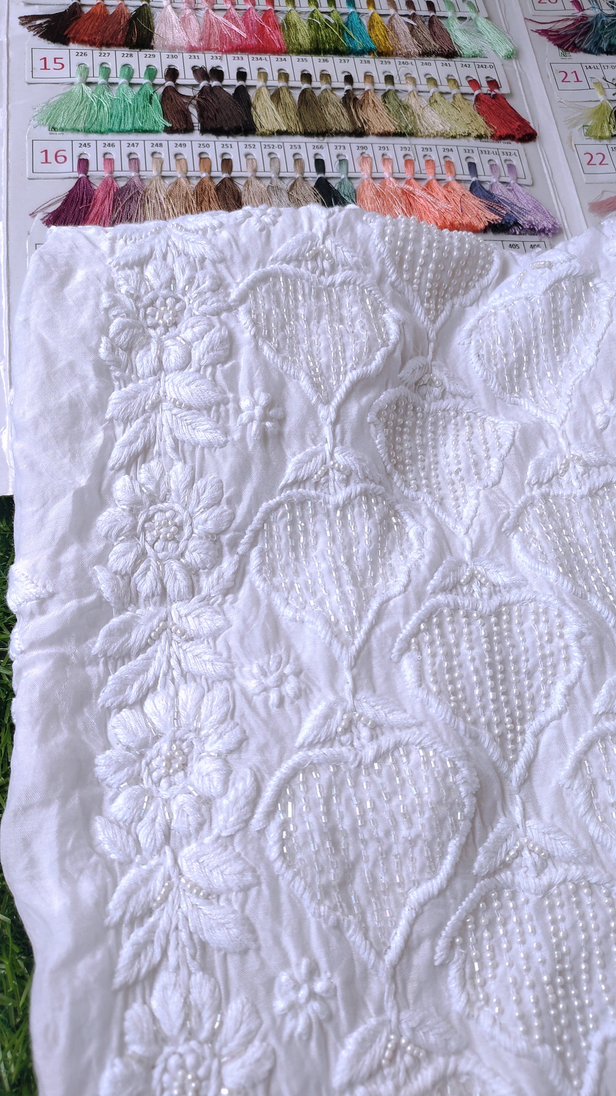 White Aylina premium soft fabric Chikankari kurta with pearl and cutdana embroidery, handmade Lucknow Chikankari by LVW Fashions.