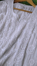 White Aylina premium soft fabric chikankari kurta with pearls and cutdana embroidery, handmade by LVW Fashions in Lucknow style.