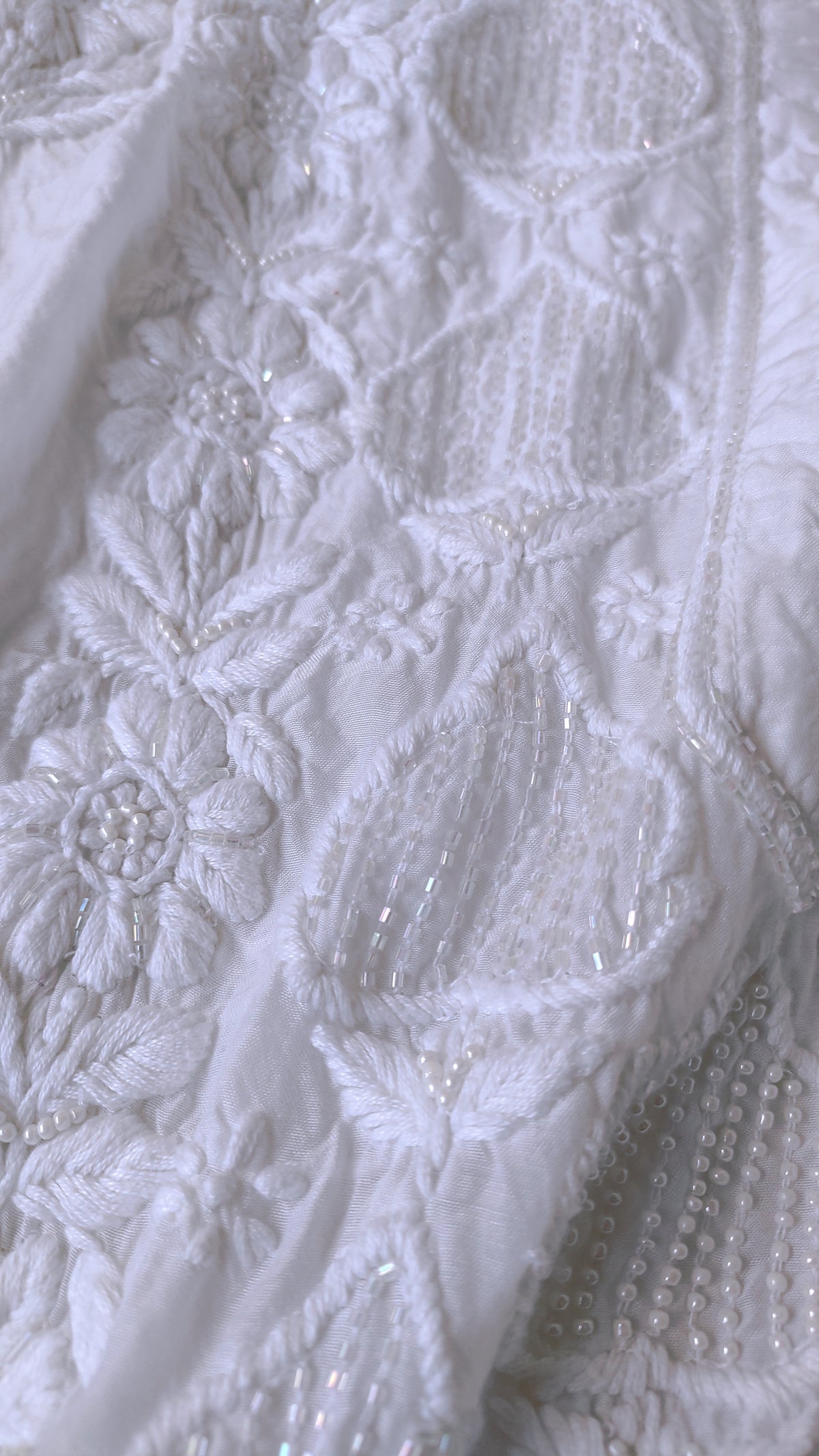 White Aylina Premium soft fabric Chikankari Kurta with pearl and cutdana embroidery, handmade by LVW Fashions in Lucknow style.