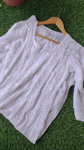 White Aylina Premium Soft Fabric Chikankari Kurta by LVW Fashions with pearls and cutdana embroidery, luxurious handmade Lucknow style.