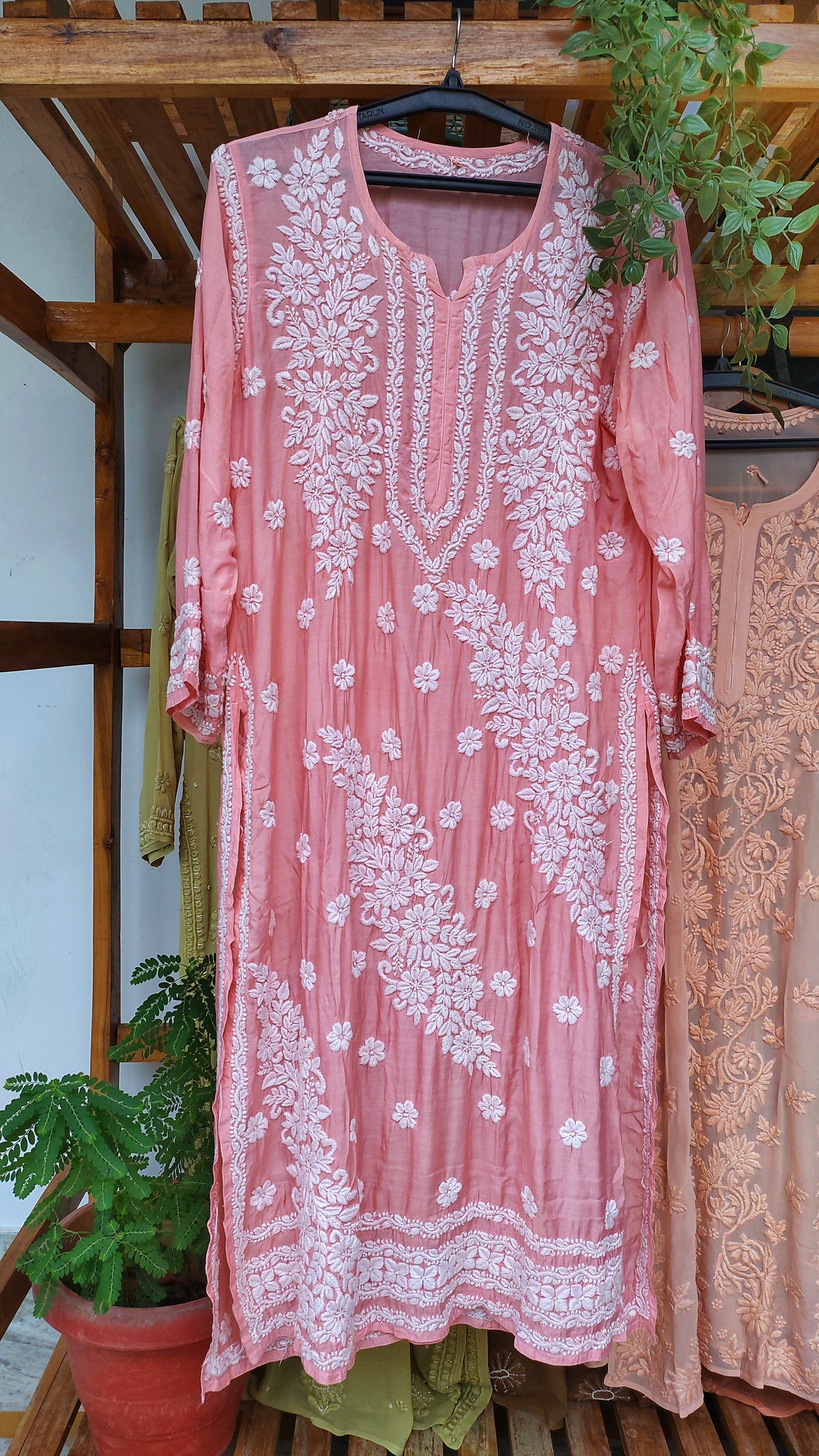 Handmade Feriha Brightish Peach silk long Kurta with intricate Lucknow Chikankari from LVW Fashions, showcasing detailed embroidery.