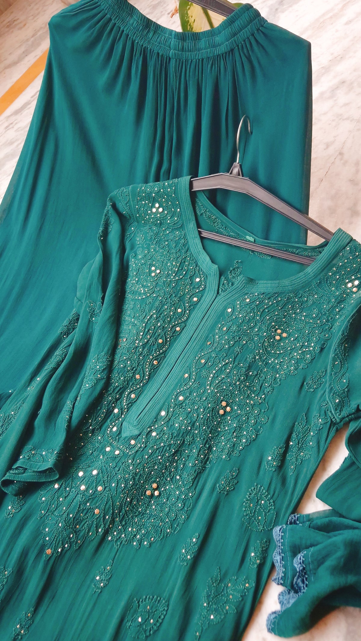 Winter green premium georgette Chikankari kurta set with intricate neck design, handmade by LVW Fashions, featuring traditional Lucknow embroidery.