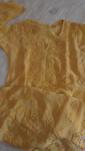 Handmade Zainy Cutwork Chikankari long kurta by LVW Fashions featuring intricate pure embroidery and traditional Lucknow chikankari design.