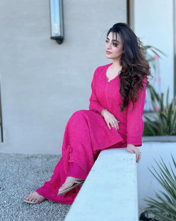 Hot pink Zeba premium georgette Chikankari Kurta set by LVW Fashions, featuring intricate handmade Lucknow Chikankari embroidery.