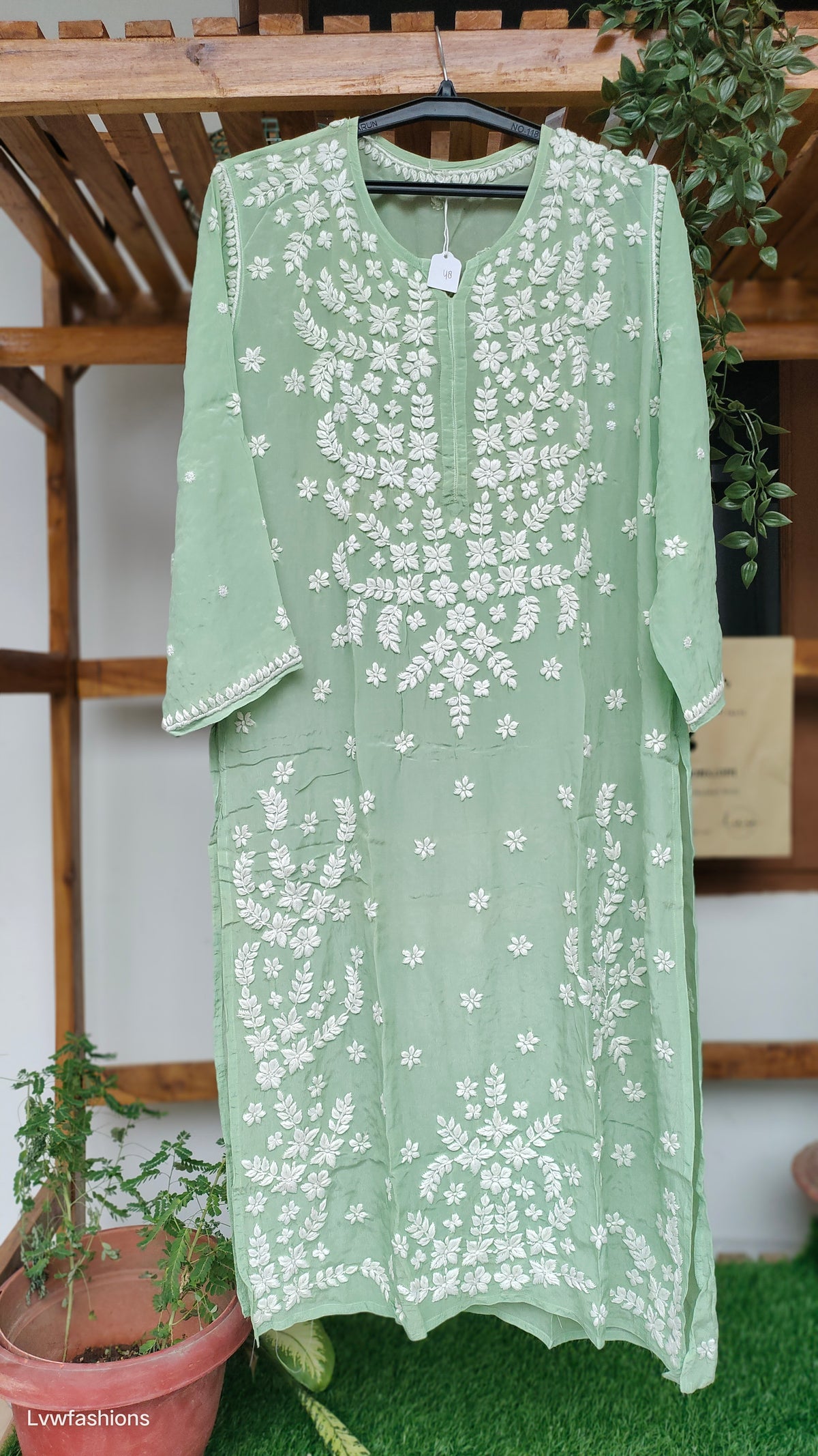 Pista green silk long Kurti with intricate chikankari embroidery by LVW Fashions, handmade in Lucknow, luxurious traditional look.