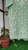 Pista green silk long kurti with intricate white chikankari embroidery by LVW Fashions, handmade Lucknow Chikankari, luxurious look.