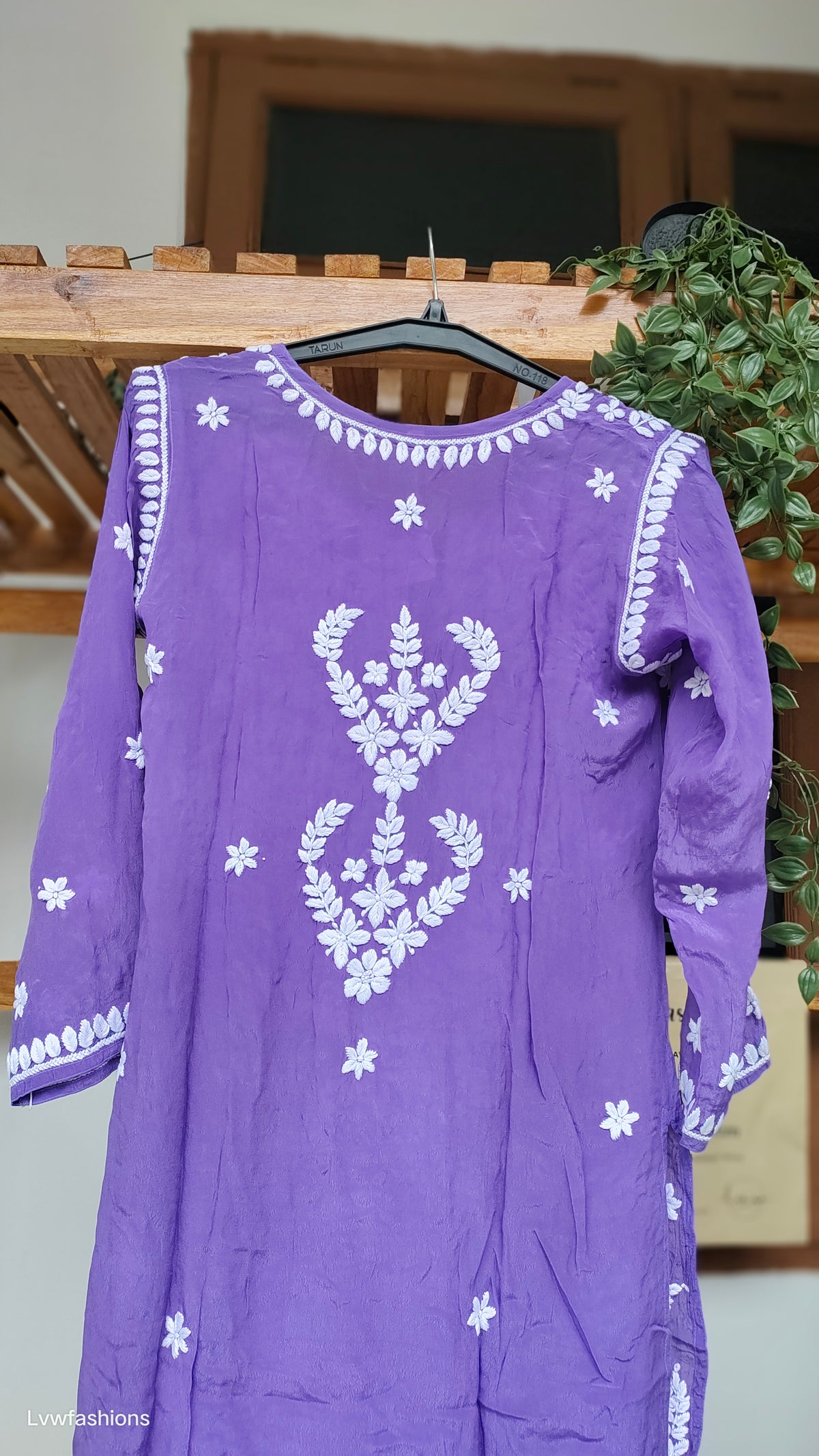 Purple silk long kurta with intricate white chikankari embroidery by LVW Fashions, handmade in Lucknow, featuring traditional craftsmanship.