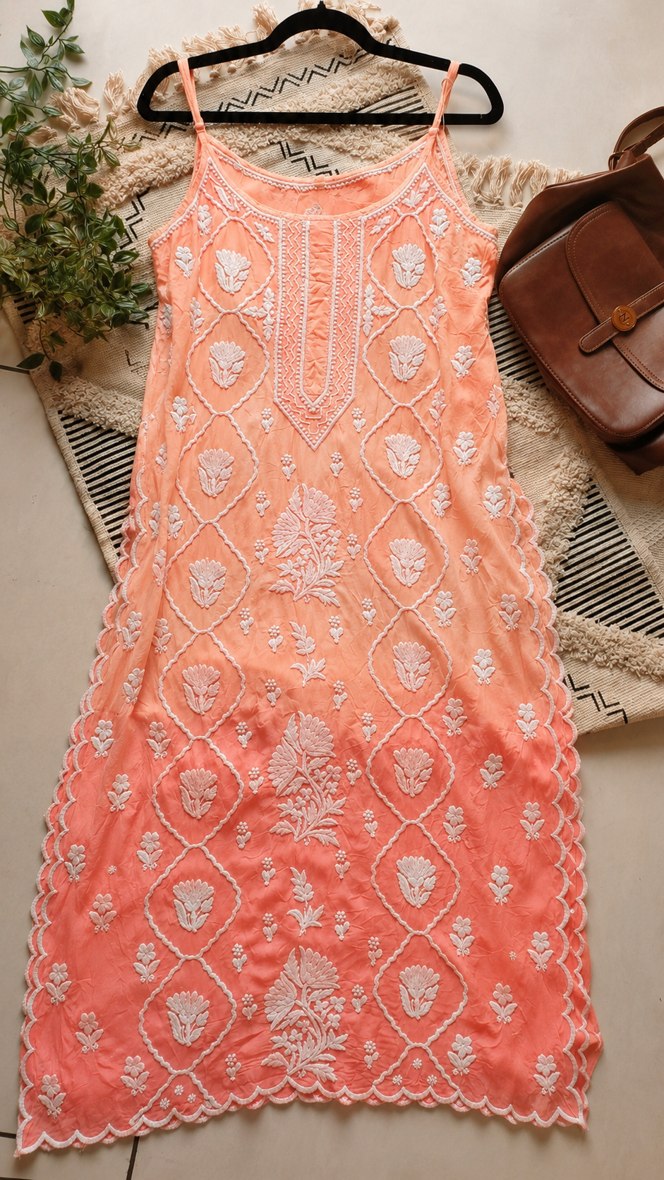 Handcrafted peach tulip crepe silk kurta by LVW Fashions featuring Lucknow Chikankari embroidery, pure premium silk, and elegant design.