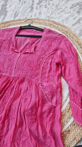 Stylish cotton chikankari tunic with side pockets, handmade by LVW Fashions, featuring intricate Lucknow chikankari embroidery.