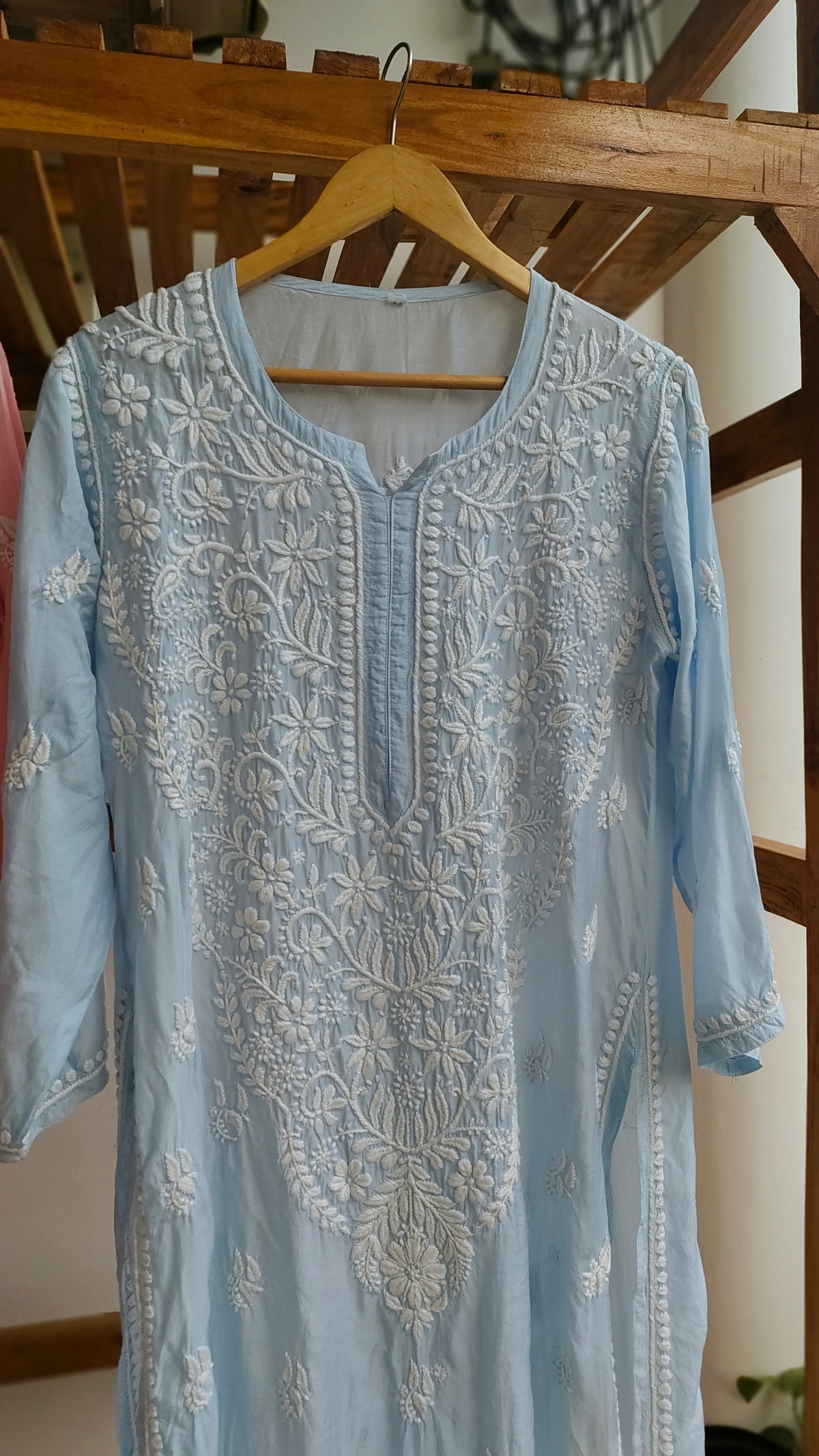 Pinkish peach Fizza muslin silk Chikankari kurta by LVW Fashions with intricate handmade Lucknow embroidery.