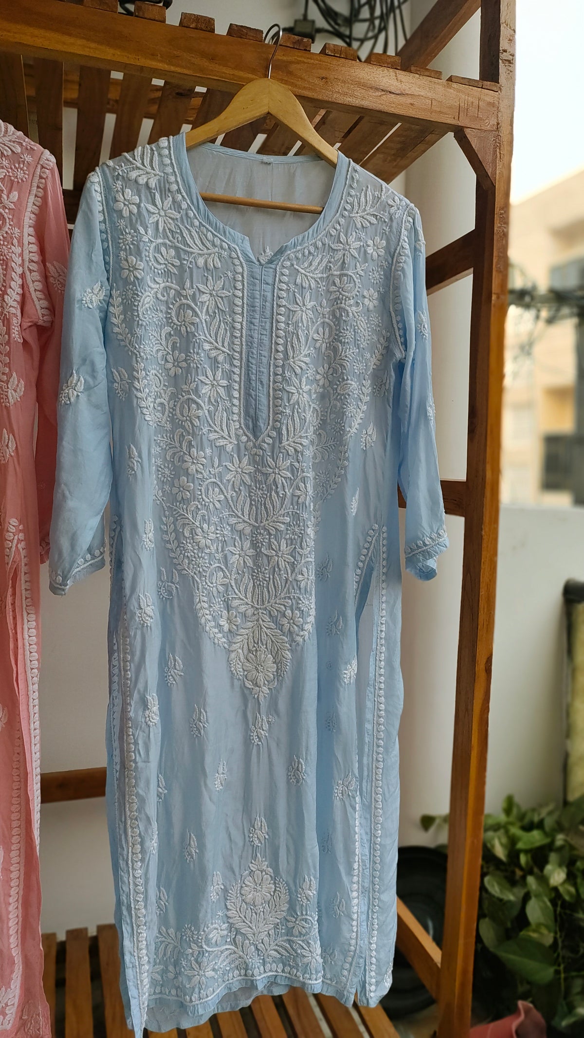 Pinkish peach Fizza muslin silk Chikankari kurta by LVW Fashions, with intricate handmade Lucknow embroidery, luxurious and elegant.