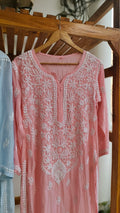 Pinkish peach Fizza muslin silk chikankari kurta by LVW Fashions featuring intricate handmade Lucknow chikankari embroidery.