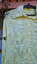 Elegant handcrafted silk Chikankari shirt by LVW Fashions featuring intricate Lucknow Chikankari embroidery.