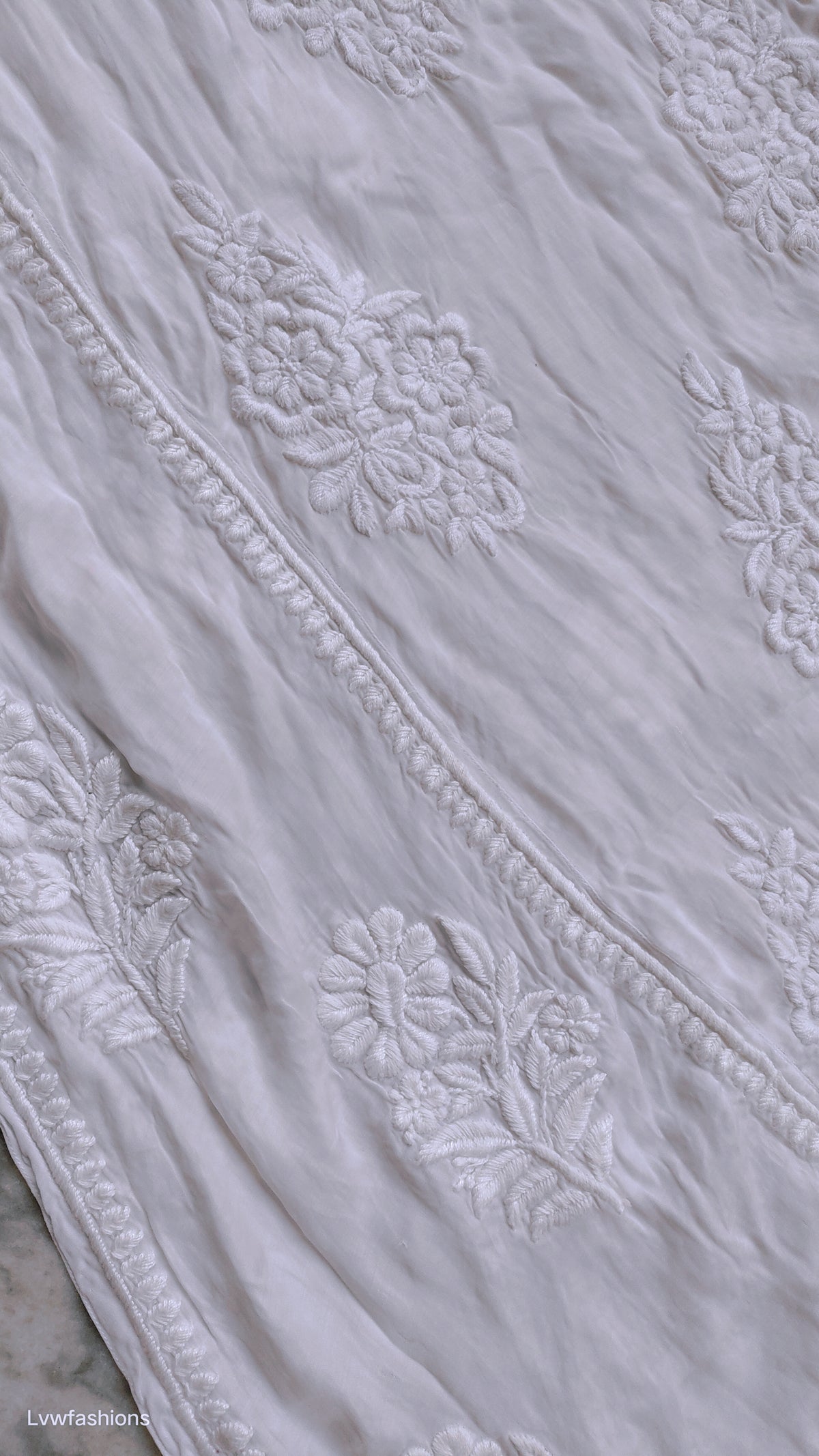 Super luxurious silk Chikankari long A-line kurta by LVW Fashions with intricate handmade Lucknow Chikankari design.