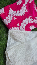 A white Adaya premium silk Chikankari kurta with Resham embroidery paired with matching Plazzos in a co-ord set, handcrafted in Lucknow.