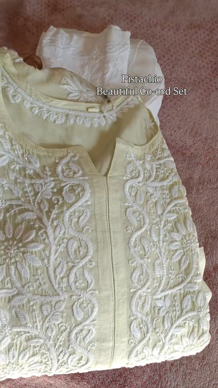 Pistachio premium soft cotton silk Chikankari co-ord set with handmade Lucknow embroidery, featuring a kurta and matching bottoms.