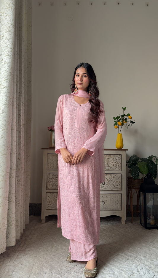 Baby pink premium georgette Kurti set with intricate handmade Lucknow chikankari and mukaish add-on, includes matching dupatta.