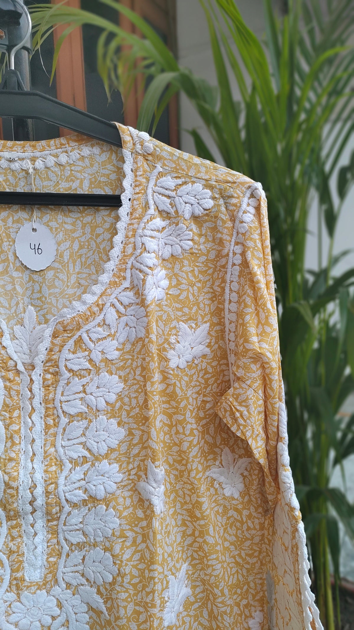 Wrist-cut premium mul soft cotton long Chikankari kurta by LVW Fashions with intricate handmade Lucknow embroidery.