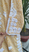 Long white Chikankari kurta with wrist cut design, handmade in Lucknow from soft Mul cotton by LVW Fashions.