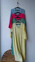 Yellow handmade Georgette Jaal Chikankari long Kurta by LVW Fashions featuring intricate Lucknow Chikankari embroidery.