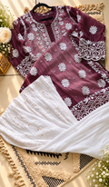 Elegant white silk long kurta with intricate handcrafted Chikankari embroidery, designed for women by LVW Fashions.