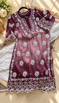 Elegant white silk long kurta for women featuring intricate handcrafted chikankari embroidery by LVW Fashions.