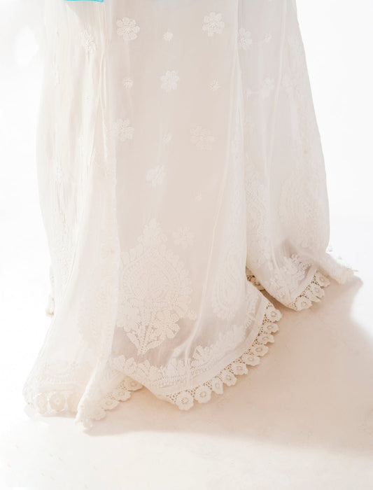 Beautiful white premium georgette plazzo sharara inner attached from LVW Fashion Luxurious Chikankari, showcasing intricate embroidery details.