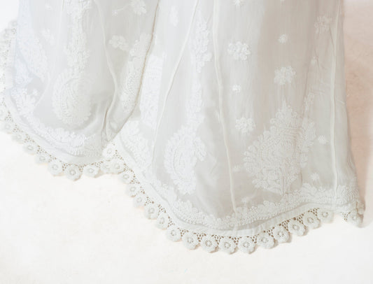 White georgette plazzo sharara inner from LVW Fashion with intricate chikankari embroidery, luxurious and elegant traditional attire.