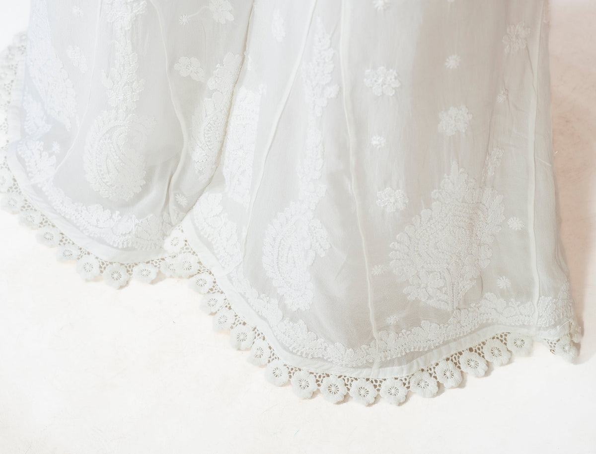 White premium georgette plazzo sharara inner with intricate chikankari embroidery, designed for elegant traditional wear.