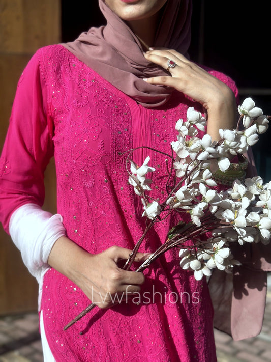 Pink and white Chikankari Sharara set by LVW Fashion Luxurious, featuring intricate embroidery and a luxurious look.
