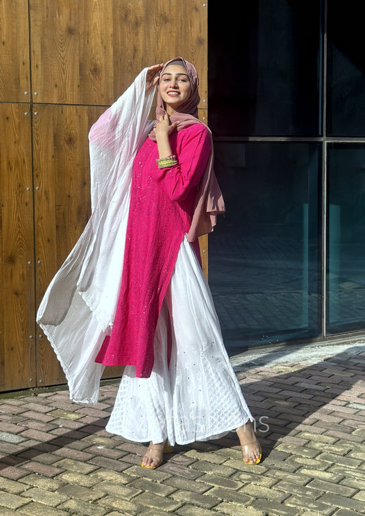 Pink and white Chikankari Sharara set by LVW Fashion, featuring intricate embroidery and a luxurious look.