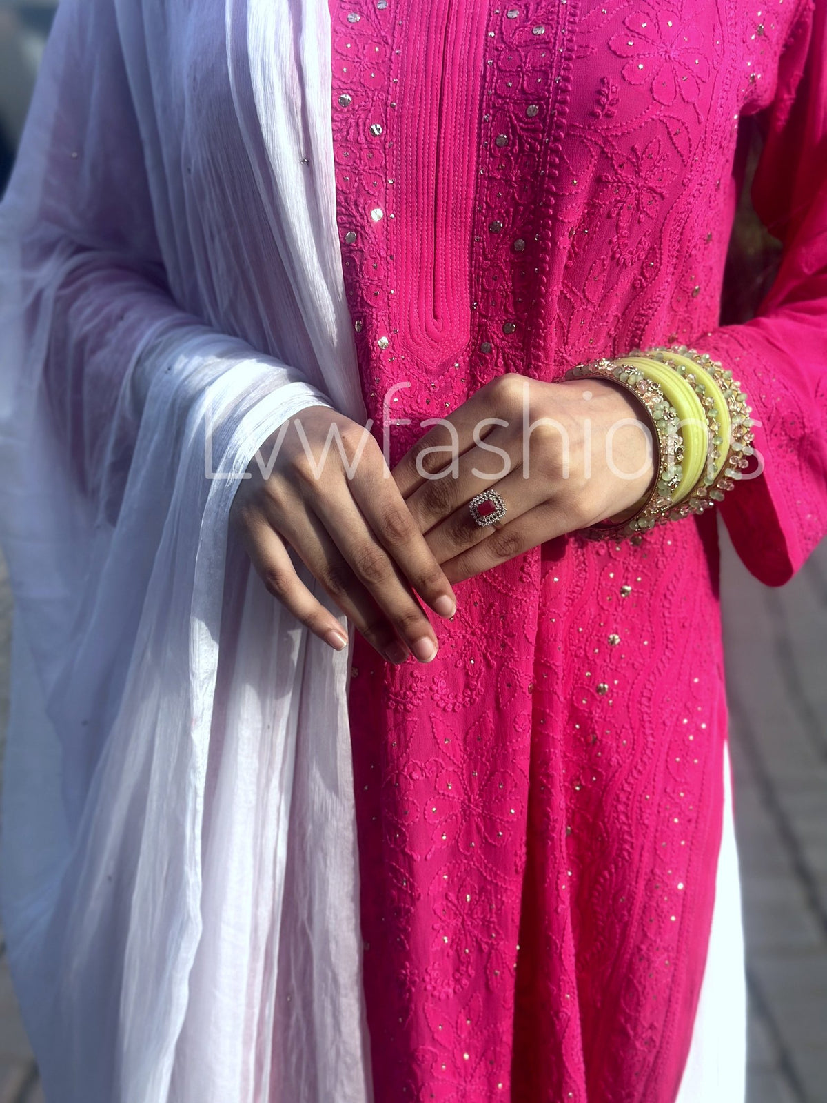Pink and white Chikankari Sharara set by LVW Fashion Luxurious Look, featuring intricate embroidery and a traditional silhouette.