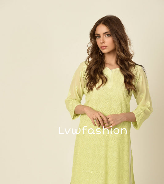 Beautiful green premium georgette kurta and sharara set with intricate chikankari embroidery by LVW Fashion.