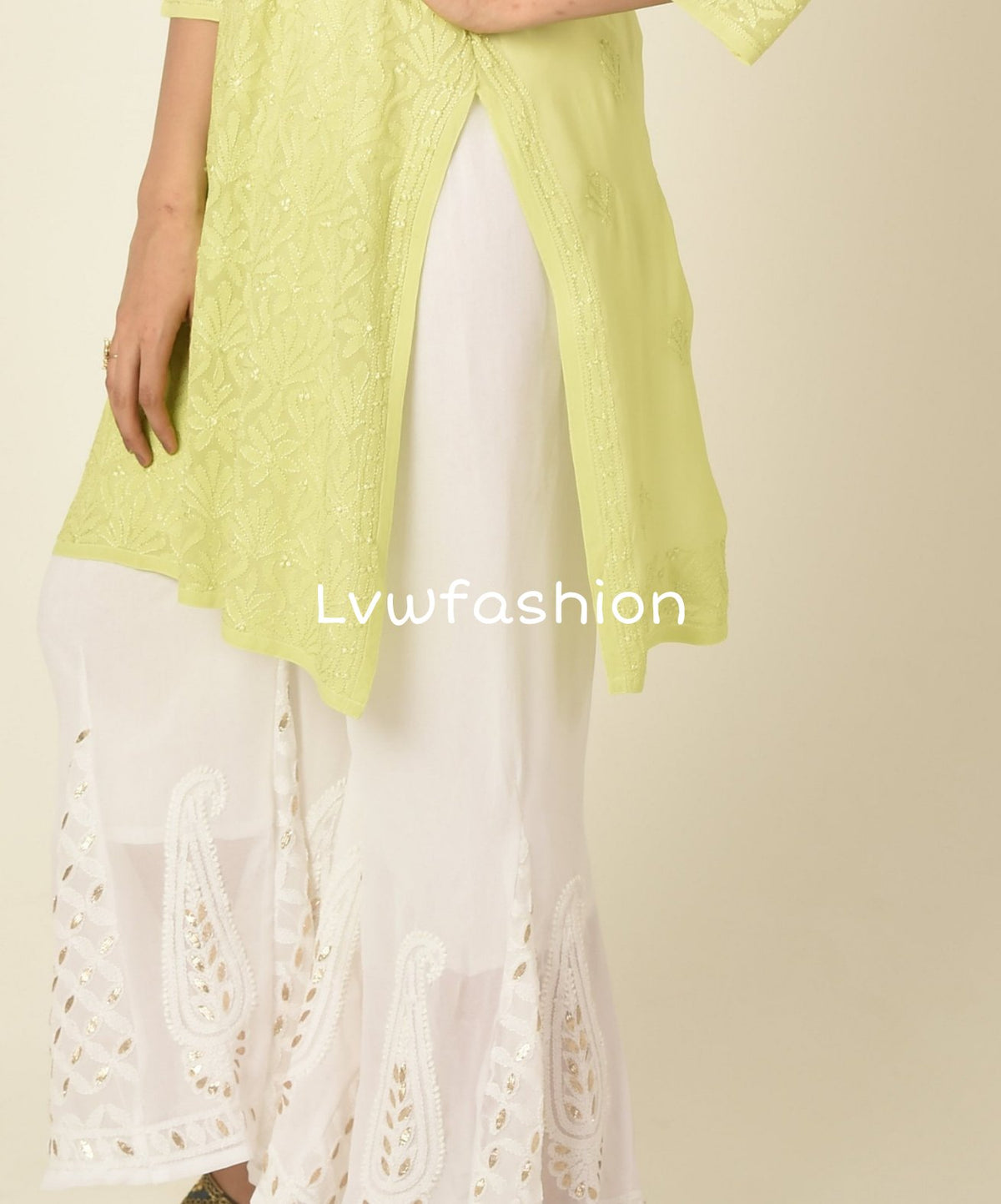 Green premium georgette kurta and sharara set with intricate chikankari embroidery, designed by LVW Fashion Luxurious Chikankari.
