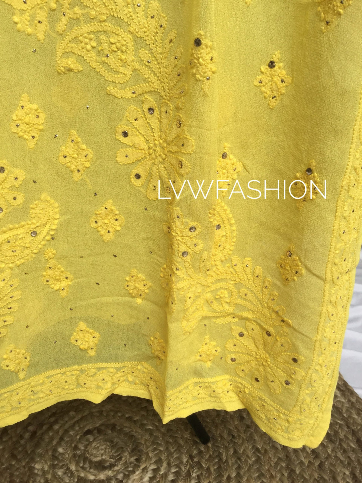 Luxury blue georgette 3-piece set by LVW Fashion with intricate Chikankari and Kamdani embroidery, showcasing elegant traditional craftsmanship.