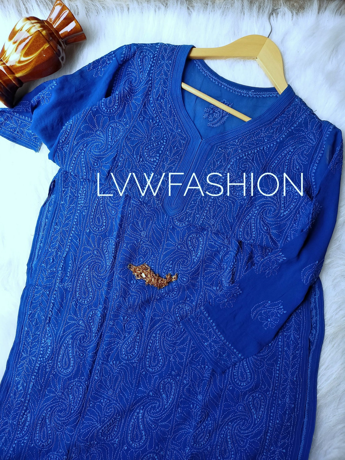 Blue and white georgette 3-piece set by LVW Fashion with intricate chikankari embroidery, luxurious and elegant traditional attire.