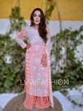 Luxurious cherry pink Georgette kurta with chikankari embroidery and matching slip by LVW Fashion.