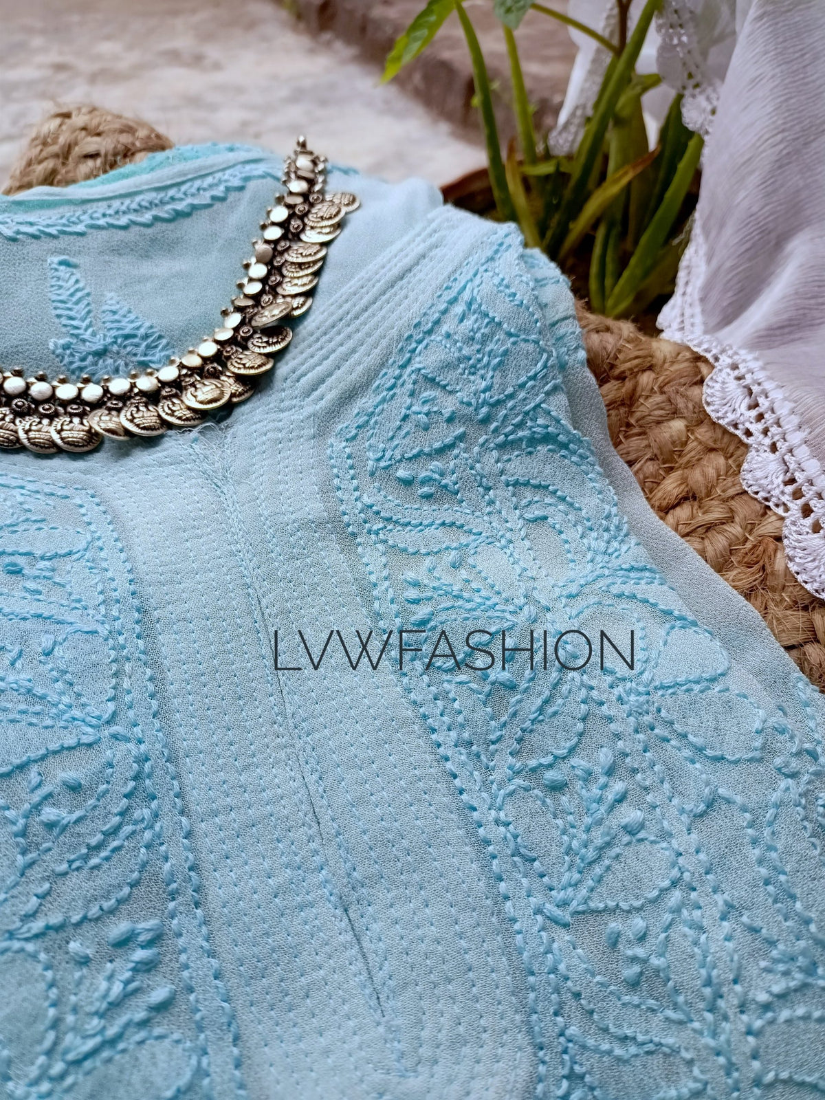Luxurious Firozi and white Chikankari premium set by LVW Fashion, featuring intricate embroidery and elegant fabric design.