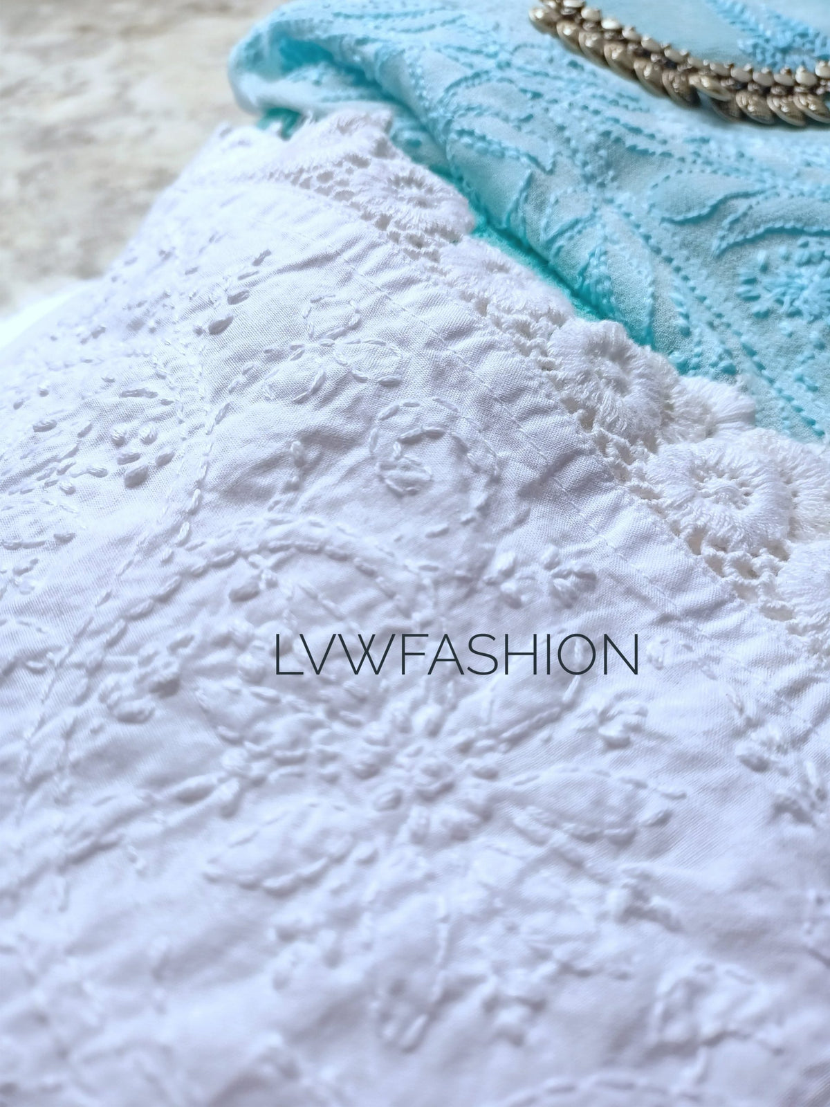 Firozi and white premium Chikankari set by LVW Fashion, luxurious traditional Indian embroidery on elegant fabric.