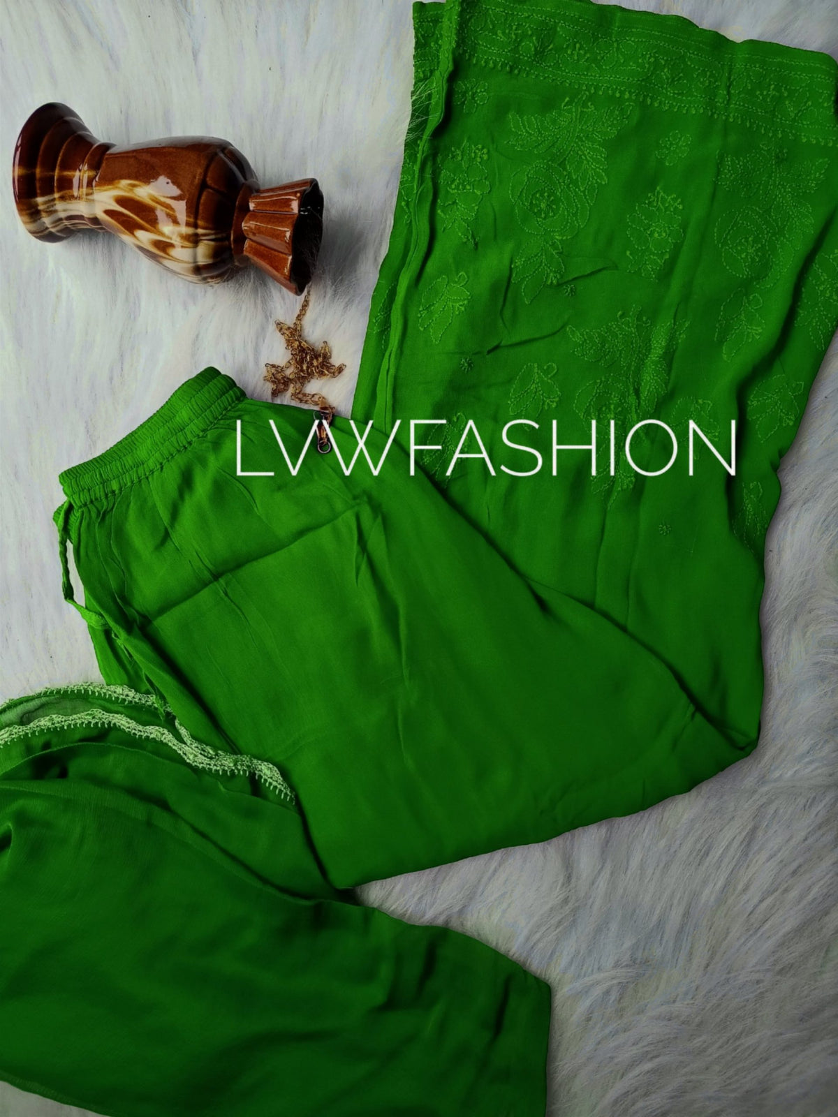 Green premium georgette 3-piece plazzos set by LVW Fashion Luxurious Chikankari, includes top, plazzos, and dupatta.