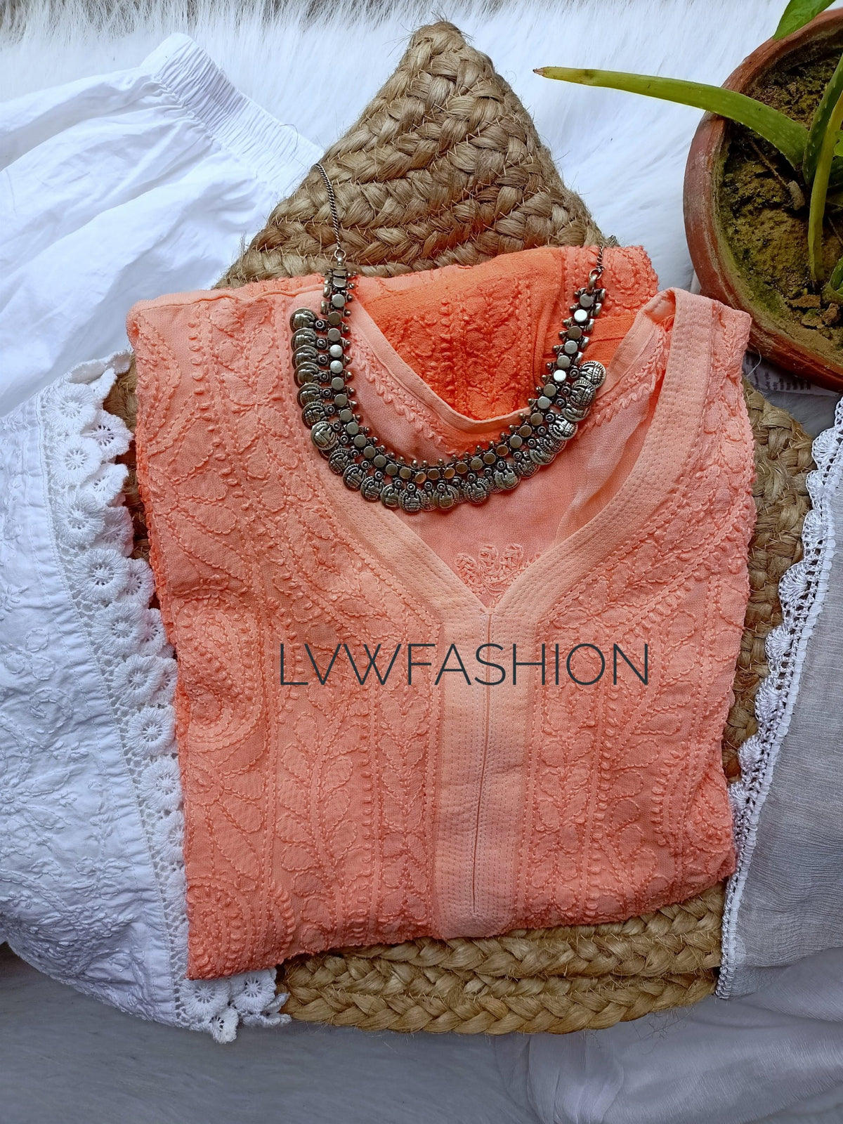 Peach ombre Love premium georgette 3-piece set by LVW Fashion with intricate chikankari embroidery on a luxurious fabric.
