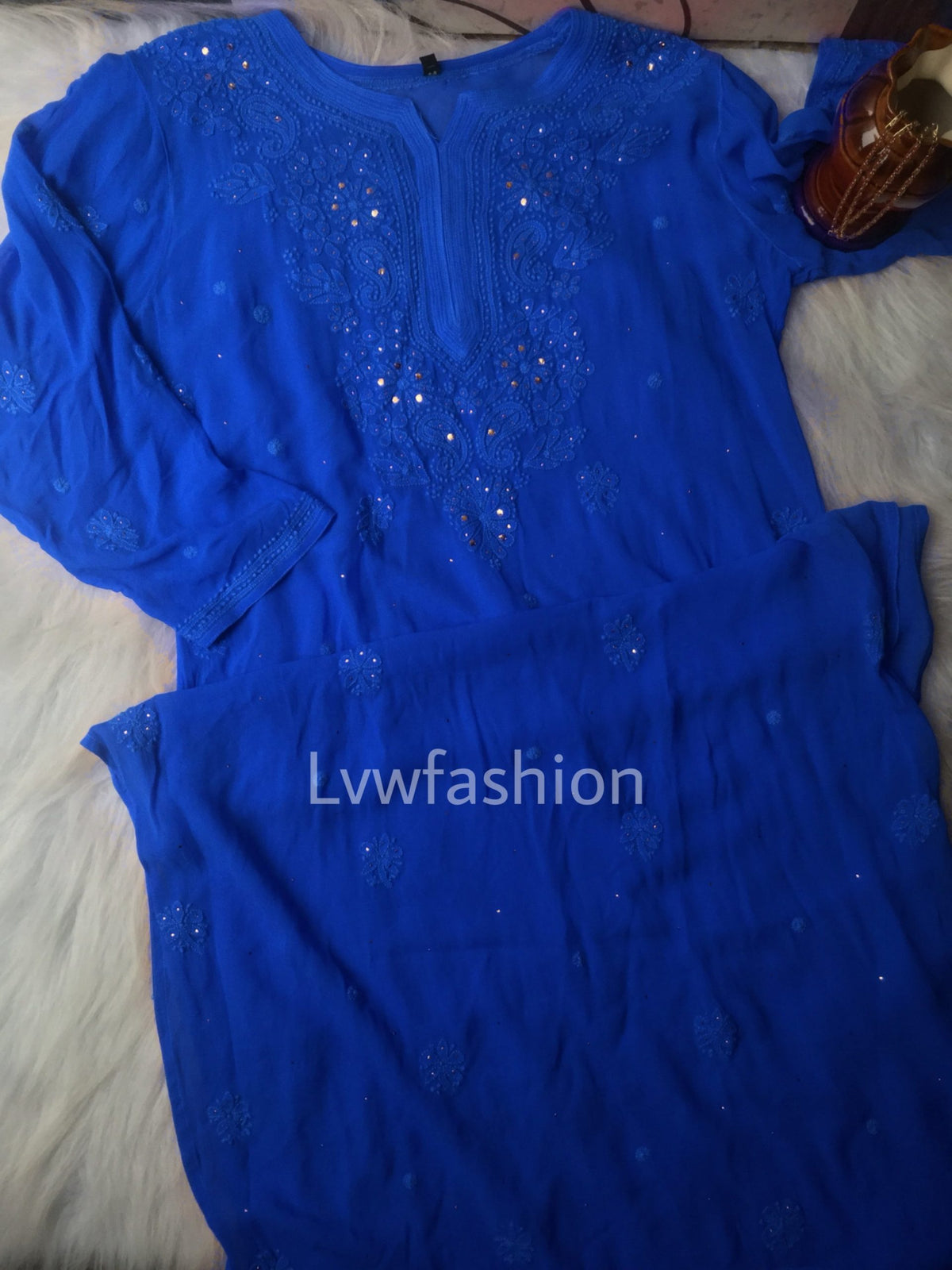 Blue premium georgette 3-piece set with slip by LVW Fashion Luxurious Chikankari, featuring intricate embroidery and lightweight fabric.
