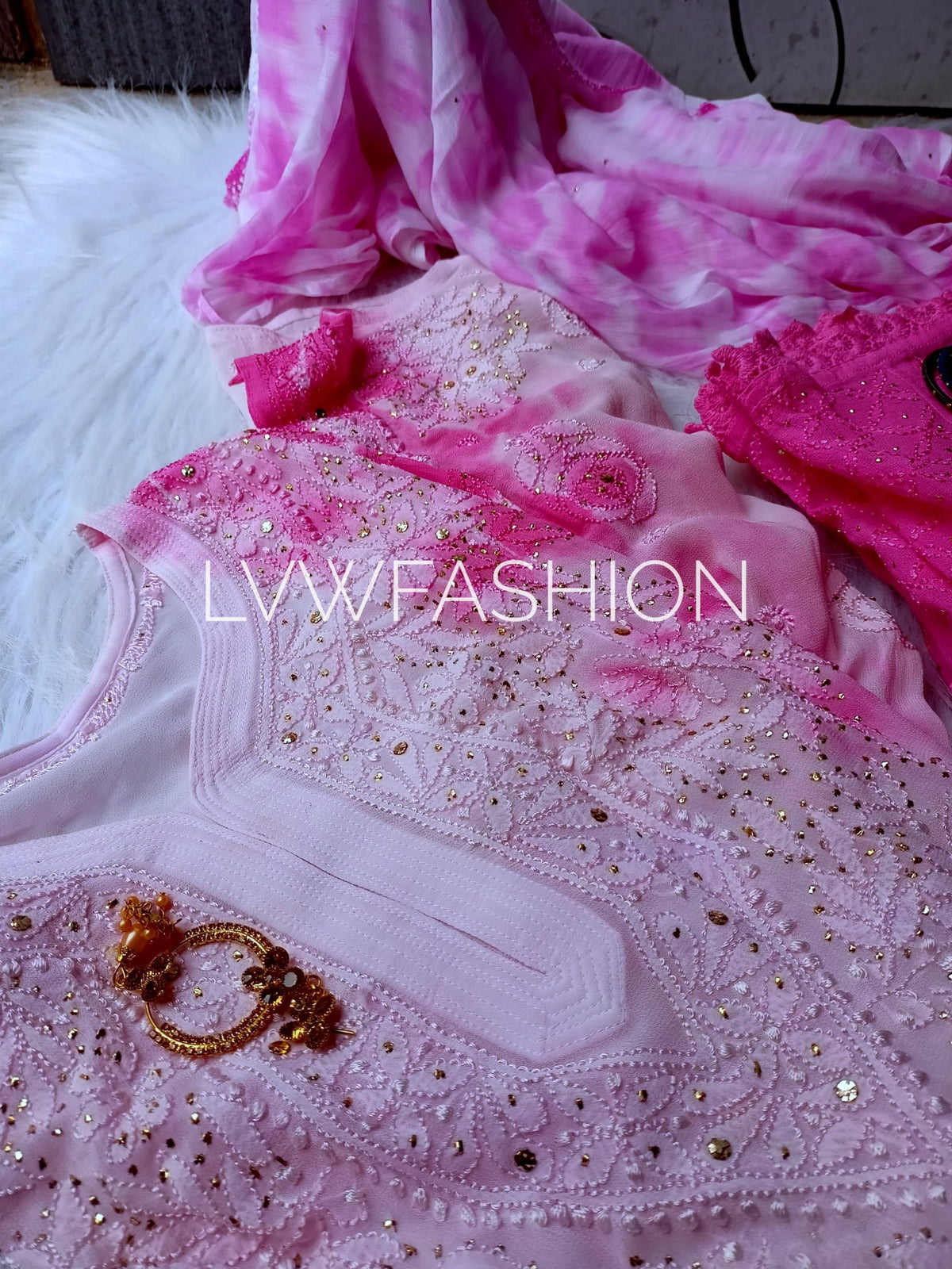 Luxurious pink tie and dye georgette 3-piece set by LVW Fashion with chikankari embroidery, elegant and vibrant for traditional wear.