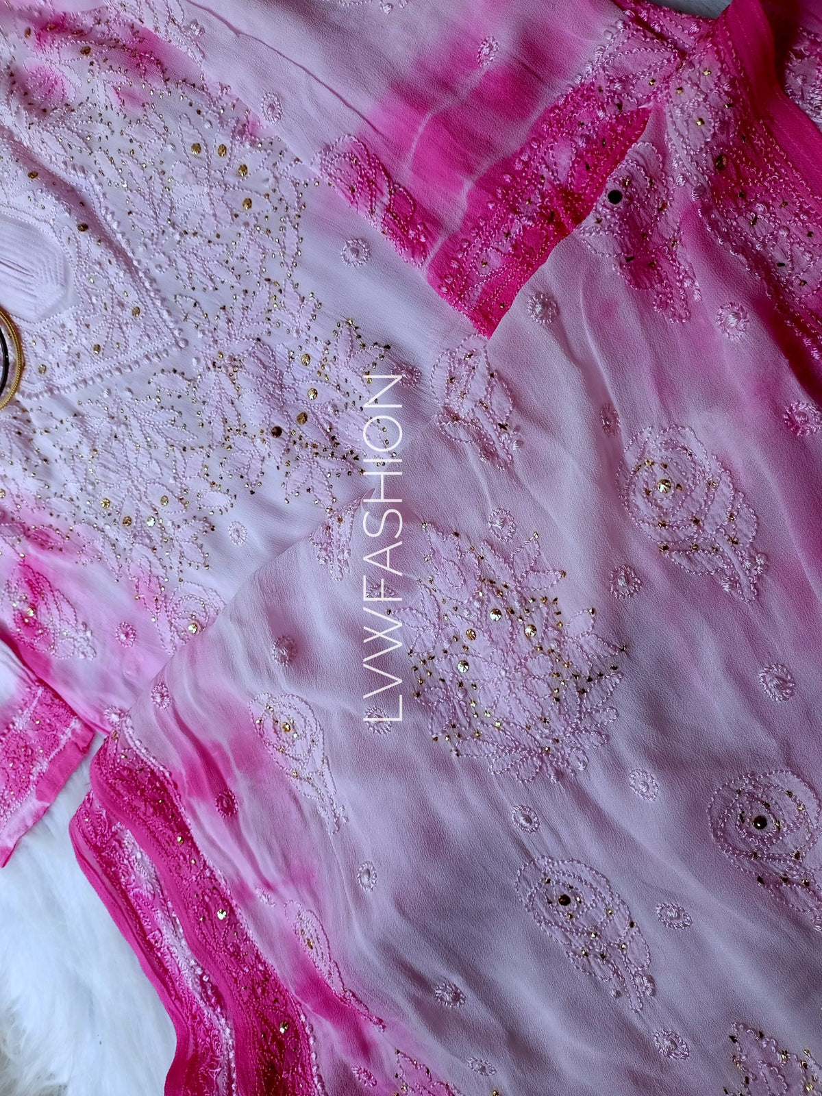 Premium pink tie and dye georgette 3-piece set by LVW Fashion Luxurious Chikankari featuring intricate detailing and elegant fabric.