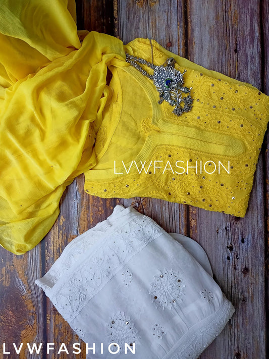 White and yellow georgette gharara set with intricate chikankari embroidery from LVW Fashion, featuring a traditional and elegant design.